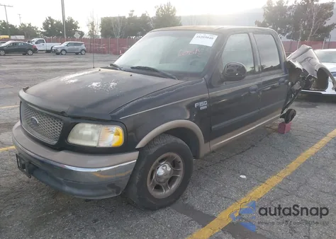 2002 Ford F-150 Lariat/Xlt z USA, uszkodzony, nr VIN 1FTRW07LX2KC53615